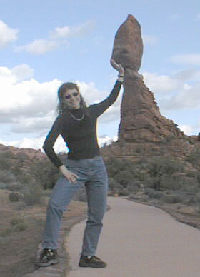 Cyndi holds up a rock